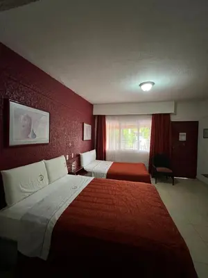 Cama o camas de una habitación en Hotel La Quinta Posada Real