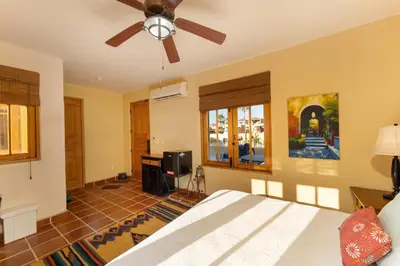 Cama o camas de una habitación en Casa Juanchi Mountain views and just steps from restaurants, pool, and the beach of Loreto Bay