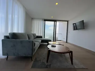 Una televisión o centro de entretenimiento en frente al malecón, 5 min zona dorada by G P S rentas