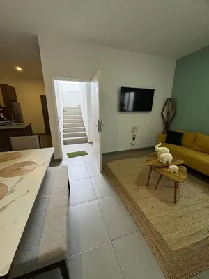 Una televisión o centro de entretenimiento en El Departamento Playa Sur