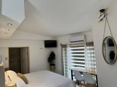 Cama o camas de una habitación en Suite Mirador Deluxe