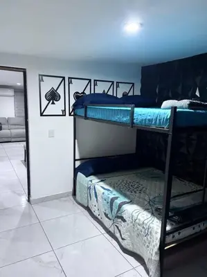 Cama o camas de una habitación en Facturamos, Un descanso ideal, a 5 minutos del malecón