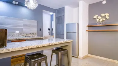 Una cocina o zona de cocina en Homesuites Rotarismo