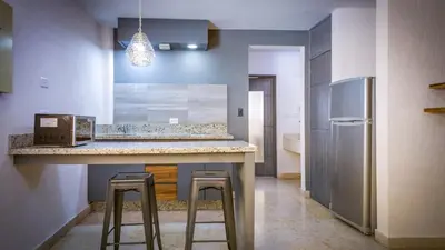Una cocina o zona de cocina en Homesuites Rotarismo