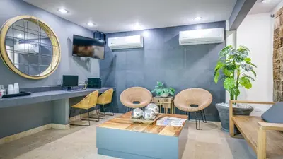Zona de estar de Homesuites Rotarismo