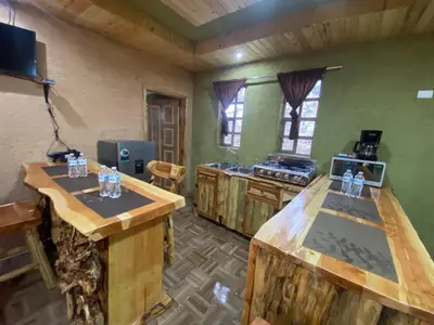 Una televisión o centro de entretenimiento en Cabañas Rochivo Ranch