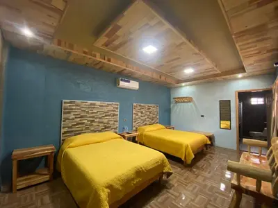 Cama o camas de una habitación en Cabañas Rochivo Ranch