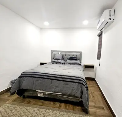 Cama o camas de una habitación en Departamento Pitagoras No 2