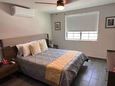 Cama o camas de una habitación en Hermosa y cómoda casa