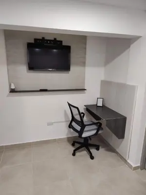 Una televisión o centro de entretenimiento en San Marcos Hotel Guaymas