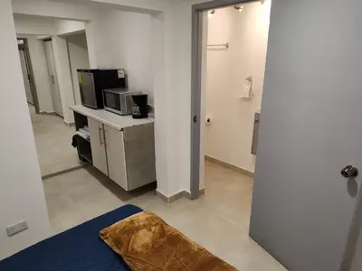 Una televisión o centro de entretenimiento en San Marcos Hotel Guaymas