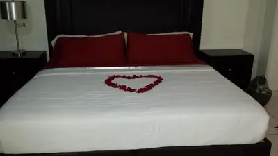 Cama o camas de una habitación en Premier Hotel Suites