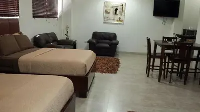 Zona de estar de Premier Hotel Suites