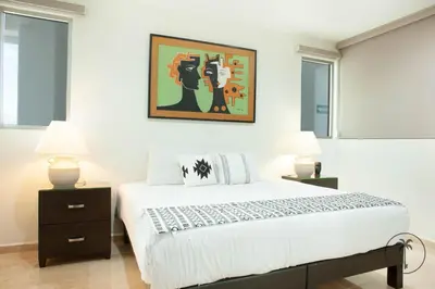 Cama o camas de una habitación en Spacious Apartment with Private Balcony & Ocean View - Brujas