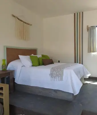 Cama o camas de una habitación en Tres Velas Surf
