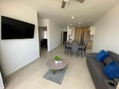 Una televisión o centro de entretenimiento en Nuevo Departamento con Excelente Ubicación y Muy Bonita Alberca - Residencial Almarena II