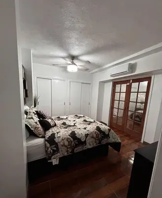Cama o camas de una habitación en Departamento totalmente equipado