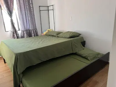 Cama o camas de una habitación en Ancla 201 Departamento Familiar