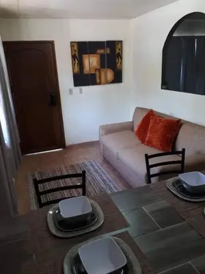 Zona de estar de Casa del Carmen, hermoso departamento en Loreto