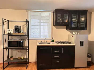 Una cocina o zona de cocina en Acogedor departamento en Nogales