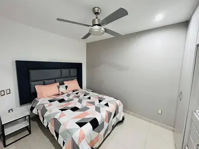 Cama o camas de una habitación en a pie de playa con vista al mar by G P S rentas
