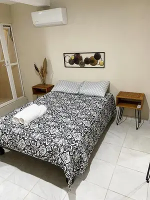 Cama o camas de una habitación en Casa Familiar Chocolate - Olímpica - 5 Min del Malecón