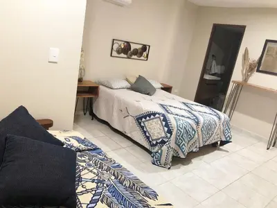 Cama o camas de una habitación en Casa Familiar Chocolate - Olímpica - 5 Min del Malecón