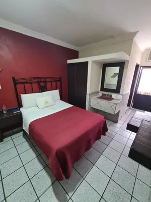 Cama o camas de una habitación en Hotel TorreBlanca