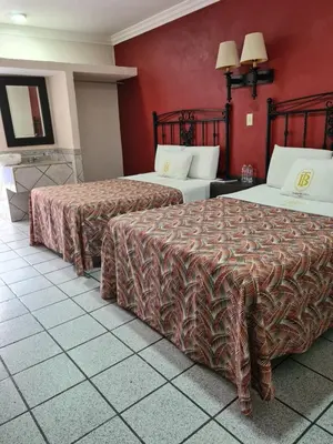 Cama o camas de una habitación en Hotel TorreBlanca