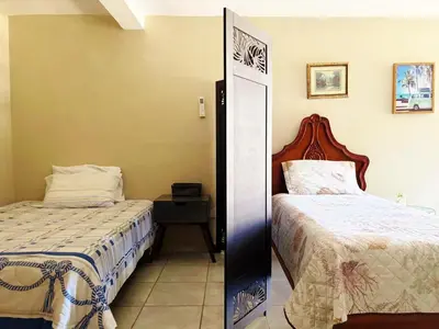 Cama o camas de una habitación en Olímpica - Room Plata - 5 Min Malecón