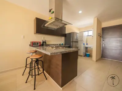 Una cocina o zona de cocina en Acogedor Dpto. c/ Alberca y Rooftop en Mazatlán - Flamingo 503