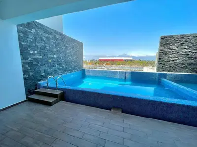 Piscina en o cerca de The One D12 Sobre el Malecón Vista al Estadio de Baseball
