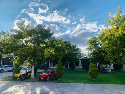 Jardín al aire libre en La Ilusión Hotel Campestre y Balneario