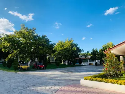 Jardín al aire libre en La Ilusión Hotel Campestre y Balneario