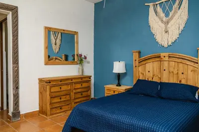Cama o camas de una habitación en La Ilusión Hotel Campestre y Balneario