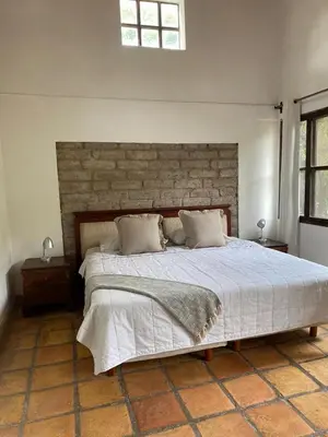 Cama o camas de una habitación en Las Pudencianas Hotel Vitivinícola