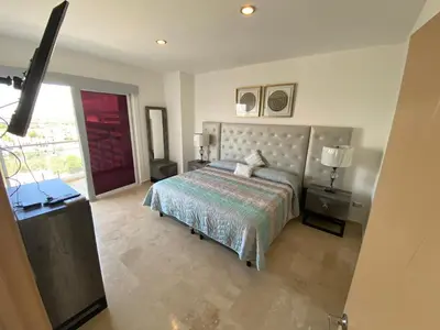 Cama o camas de una habitación en Lujoso y Exclusivo Condominio Marina Platino Plus I