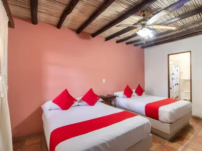 Cama o camas de una habitación en Hacienda Del Angel