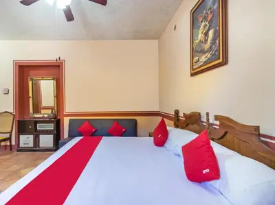 Cama o camas de una habitación en Hacienda Del Angel