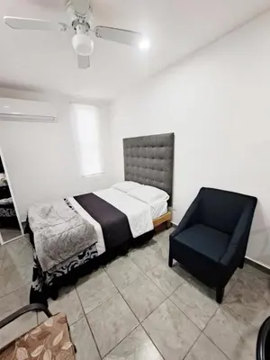 Cama o camas de una habitación en Blanco Armonía - Depto 1 - 2 Min Malecón