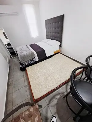 Cama o camas de una habitación en Blanco Armonía - Depto 1 - 2 Min Malecón