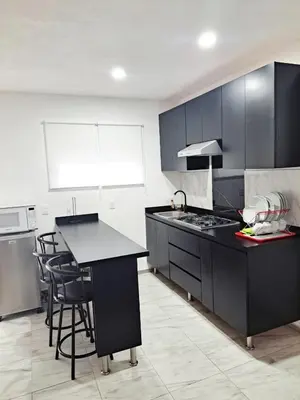 Una cocina o zona de cocina en Blanco Sereno - Depto 2 - 2 Min Malecón