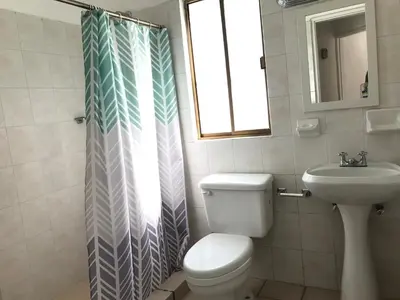 Un baño de Vista al mar y alberca privada en Sector Bahía