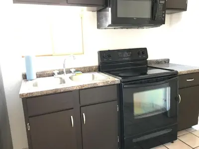 Una cocina o zona de cocina en Vista al mar y alberca privada en Sector Bahía