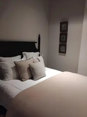 Cama o camas de una habitación en La Casona Del Banco Hotel Boutique