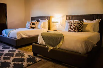 Cama o camas de una habitación en La Casona Del Banco Hotel Boutique