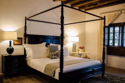 Cama o camas de una habitación en La Casona Del Banco Hotel Boutique