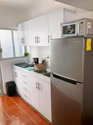Una cocina o zona de cocina en Cómodo departamento a pasos del centro y la playa