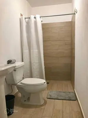 Un baño de Cómodo departamento a pasos del centro y la playa