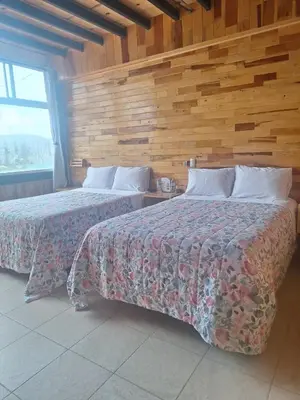 Cama o camas de una habitación en Rimusa Inn